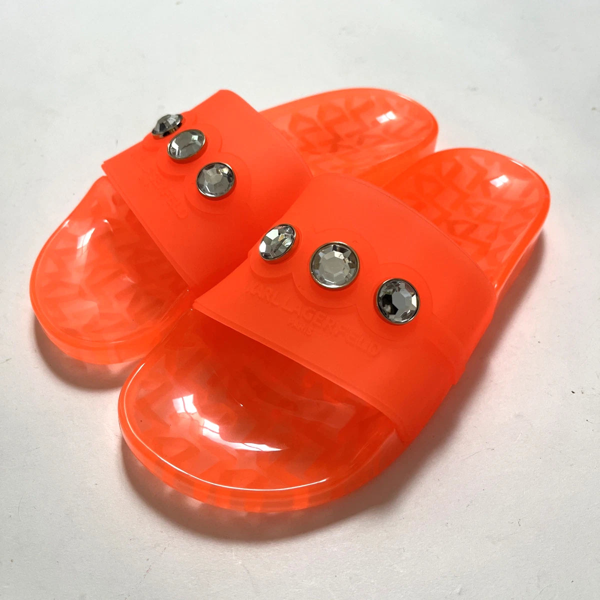 KARL LAGERFELD PARIS “TONI” Transparent Faux Jewel Slide – Orange